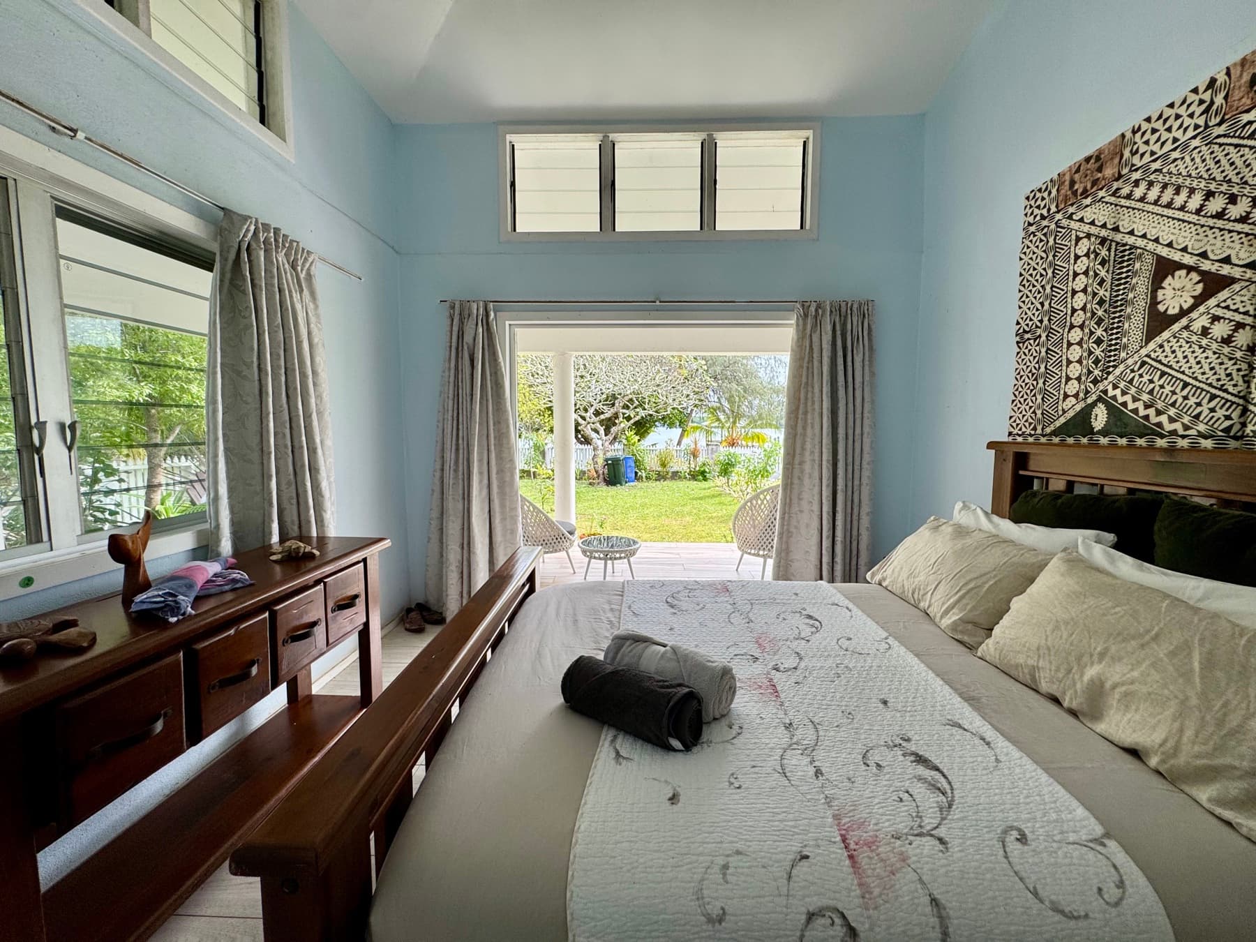 Bedroom 2: queen bed, garden side